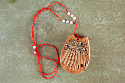 Unleash Your Inner Musician with Our Cute and Compact Cat-Shaped 8 Key Kalimba!